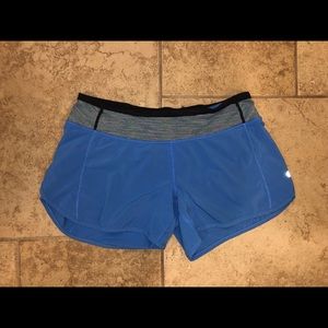 old blue lululemon speed up shorts 4’